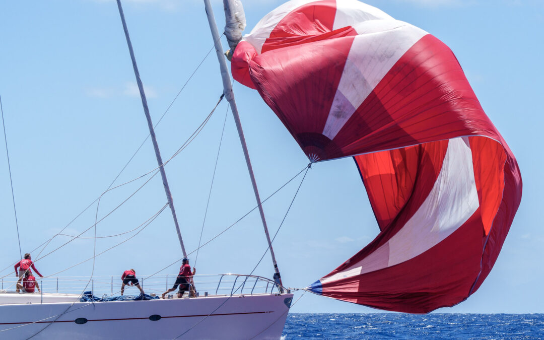 Photograph of a yacht crew working the sails at the 2023 St Barths Bucket Regatta.