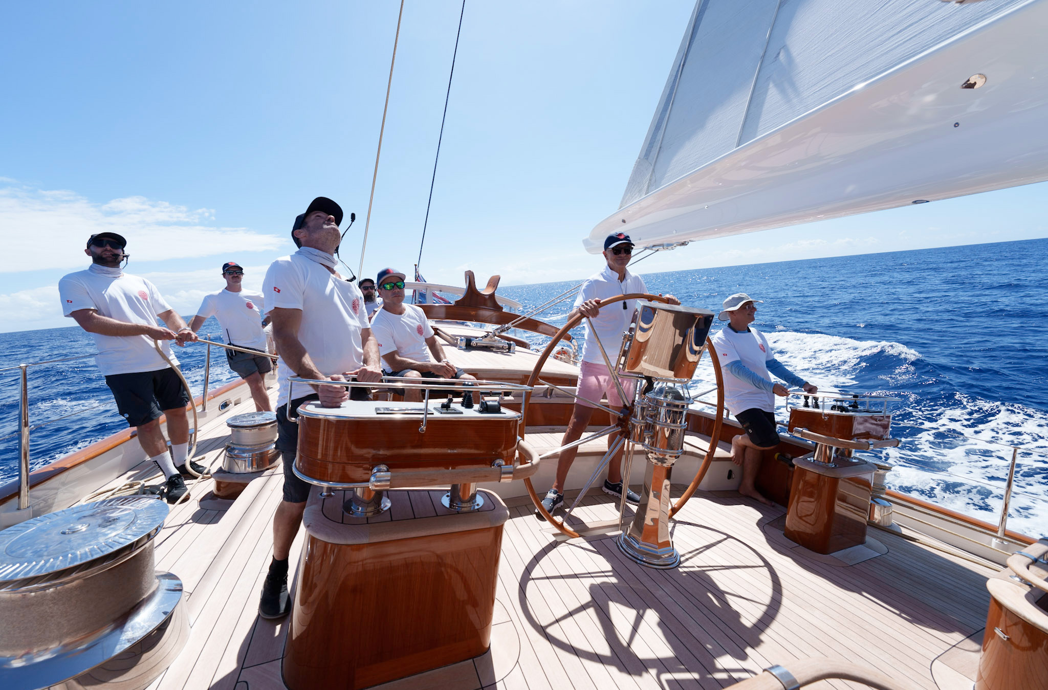 Photo of the crew of the superyacht Vijonara racing at the 2025 St Barths Bucket. Photograph by Martin Baum.