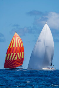 Photo of two yachts racing at the 2025 Bucket Regatta by Martin Baum.