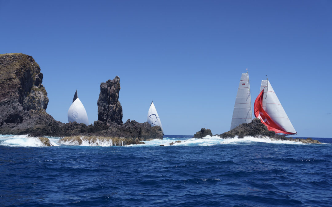 Photo of three superyachts racing at the 2025 Bucket Regatta by Martin Baum.